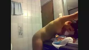 Horny Desi woman achieves pleasure by rubbing XXX clit against corner