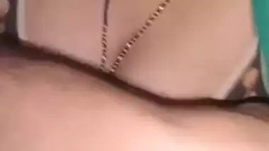 Indian XXX girl in polka-dot bra gives a blowjob to Desi man on camera