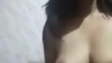 Sweet Desi gal sneaks in bathroom to show tits with big XXX nipples