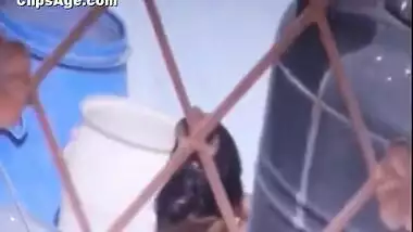 Indian desi Tamil maid taking bath outdoor video captured by neighbor guy