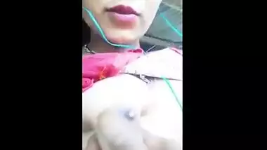 Beautiful teen plays with her firm boobs while on a video call with lover