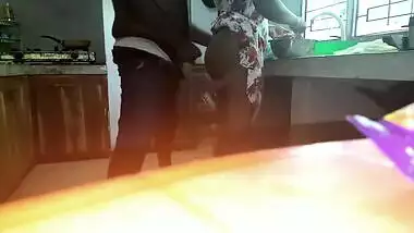 Horny man comes to Indian wife and satisfies XXX needs in the kitchen