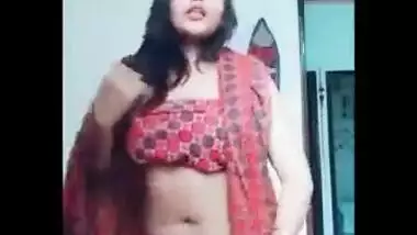 Female performs an Indian sex belly dance in a XXX manner on camera