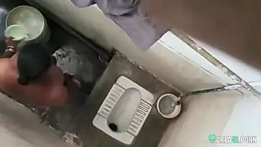 XXX clip of village aunty taking bath in outdoor taken on her son
