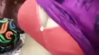 Desi girl pulls T-shirt up to bare her XXX hooters for sex viewers