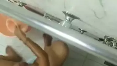 Desi wife nude bathing in bathroom recording by spy cam