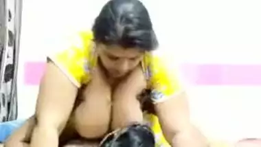 Guy lies on the bed and worships Desi wife's sexy huge XXX hooters