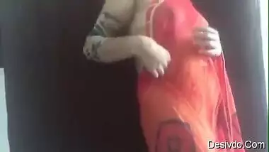 hot sexy desi wife simran bhabhi showing boobs and ass in red saree