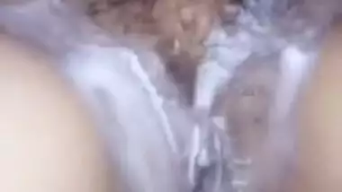 Careful Indian man shaves wife's XXX cave and fingers it before sex