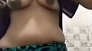 Bored Desi aunty calls the stud to surprise him with big breasts