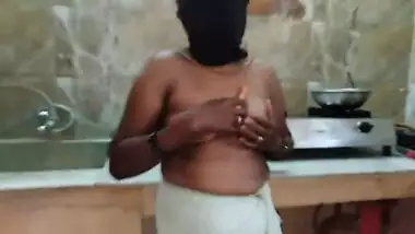 Kinky Desi maid aunty masturbates with carrot In the kitchen for nephew