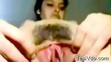 slim gal deepthi opes her hairy pussy hole closeup view